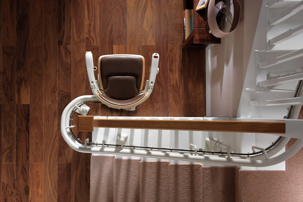 Stair chair lift for curved stairs with landings