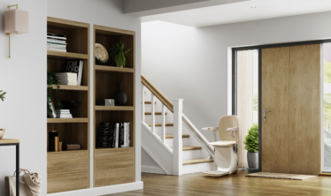 Stylish Stannah stairlift for straight stairs in a modern home